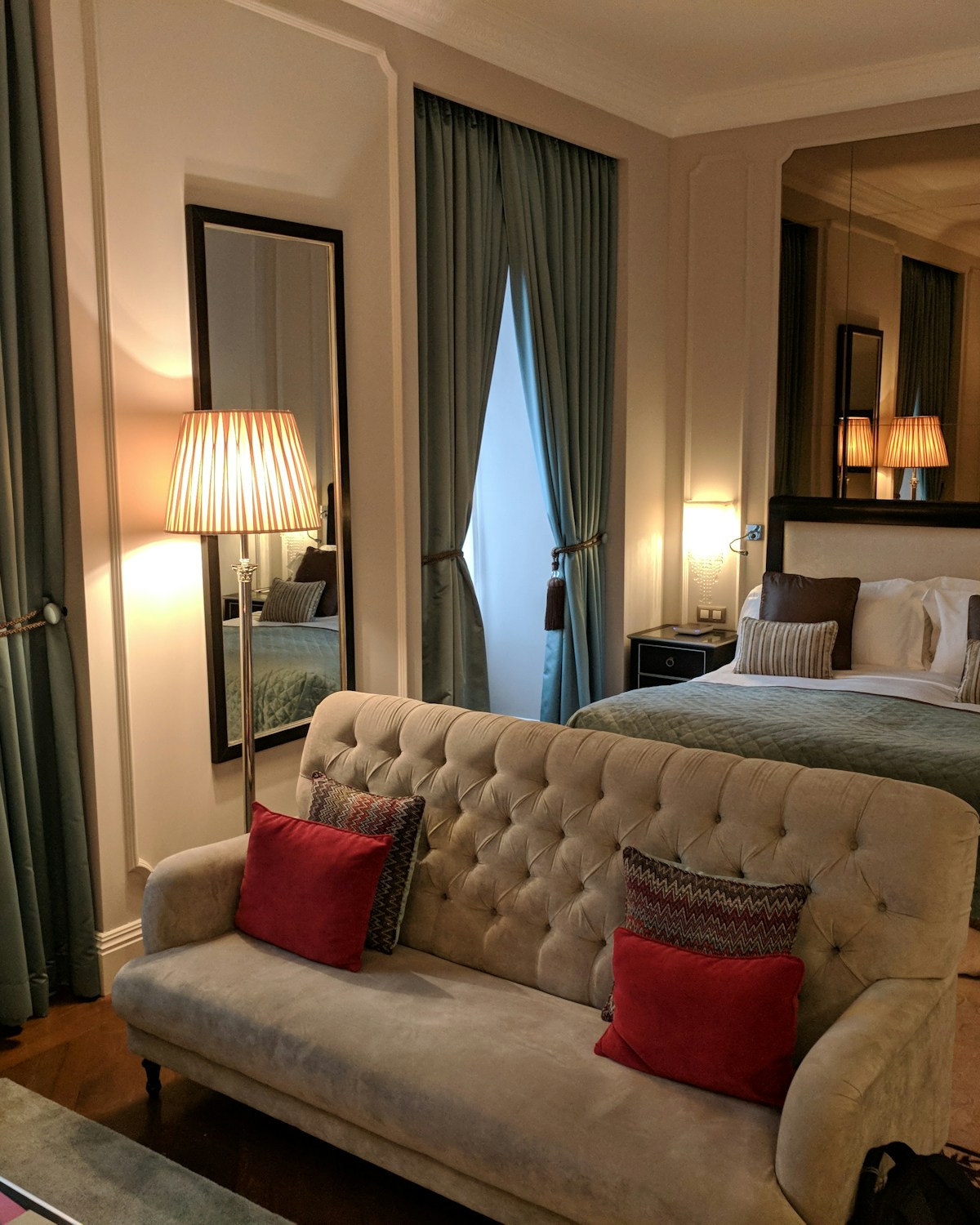 Garden Suite bedroom with comfortable bed and open terrace doors